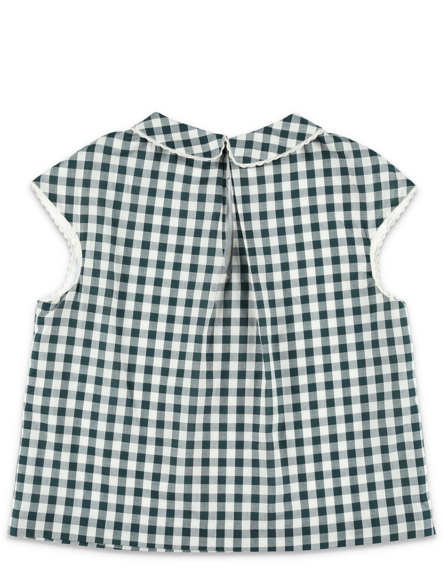 Kid - Elvia checks top - Spazio Pritelli